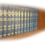 A row of law books stacked on a shelf