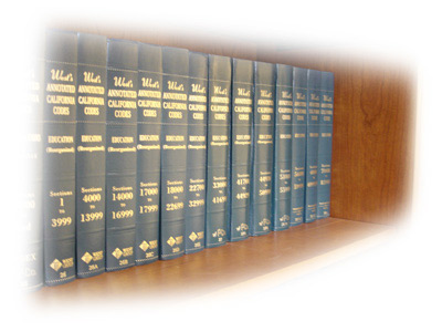 A row of law books stacked on a shelf