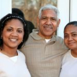 An older daughter with her parents