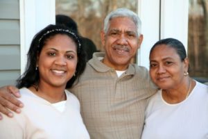 An older daughter with her parents