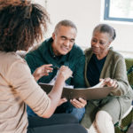 Elderly couple discussing why incapacity planning is important for their estate plan.