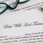 picture of a will with glasses and a pen