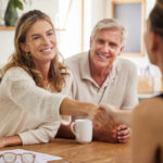 Handshake, life insurance and senior couple with lawyer for mortgage tax bills, property and financial investment. Finance, inheritance and old woman shaking hands with Real Estate AGent for a successful deal